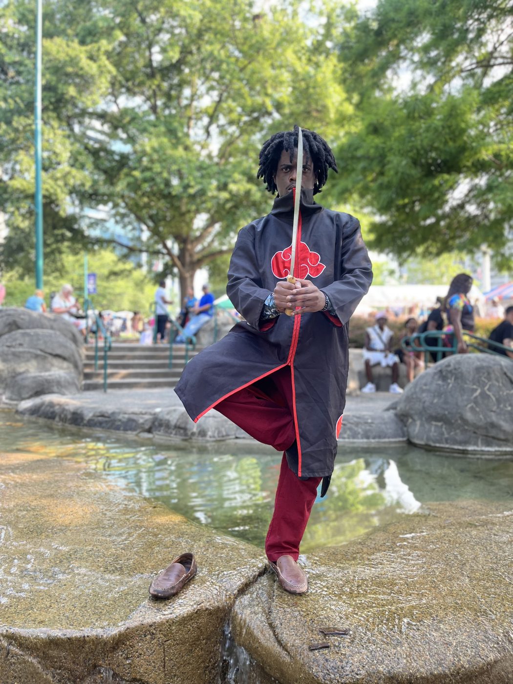 SEAUX9 balancing on one leg over water